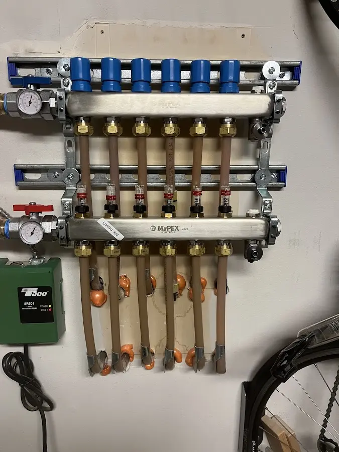 Plumber performing Water Heater Repair at a residential property in Orland Hills